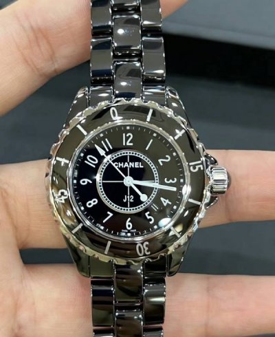 Chanel Black Ceramic J12 Watch. This Chanel classic J12 black ceramic quartz wat
