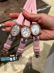 A high-quality Swiss quartz women's watch in white rose gold and Breguet Reine D