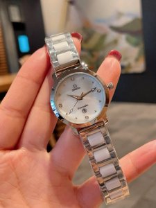 White Gold and Black Omega Fashionable Women's Quartz Watch. A watch that exude