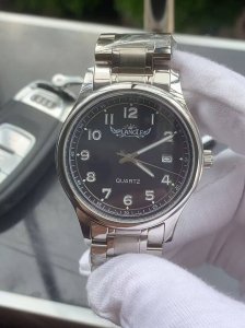 Brand: Plange - Premium Men's Watch, featuring a simple three-hand design with a