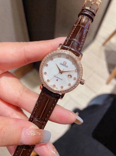 Gold + 20mm steel band + 20mm ceramic 40mm Latest Omega women's watch, original