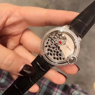 Real shot of Cartier Ballon Bleu watch, double row of diamonds, glossy black all