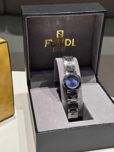 Box 10 Fendi women's watch, classic hollow strap design, white tassel dial, orig