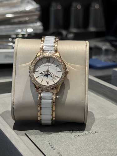 A new Chanel watch with elegant white and gold diamonds, featuring a uniquely c