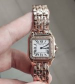 This is the timeless classic Cartier Panther medium gold watch