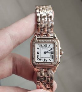 This is the timeless classic Cartier Panther medium gold watch