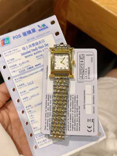 Hermes. This watch is a classic dress watch and a perfect match for a profession