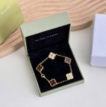 Van Cleef & Arpels' New 50Th Anniversary Commemorative Five-Flower Red Chalcedon