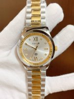 This latest Gucci white gold watch features a stunning pearl-painted dial, showc