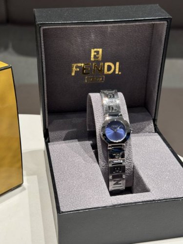 Box 10 Fendi women's watch, classic hollow strap design, white tassel dial, orig