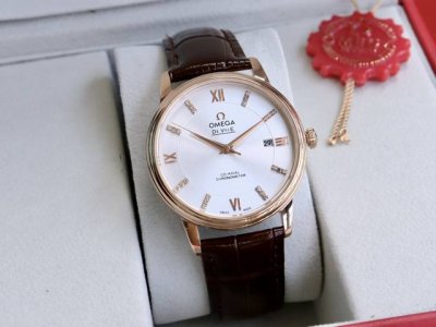 Gold +20 Omega De Ville men's watch, featuring an authentic design, curved hour