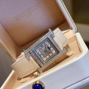 When geometric angles meet dazzling diamonds, time becomes the most elegant work