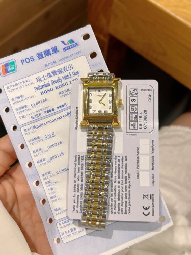 Hermes. This watch is a classic dress watch and a perfect match for a profession