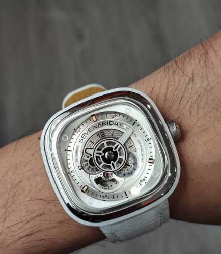 C 01 features a white matte watch bezel, crafted from durable Corian material wi