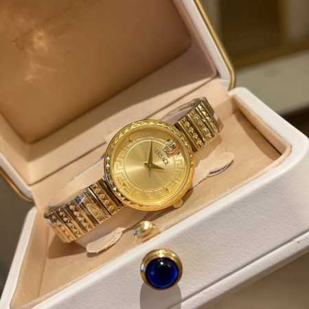 This elegant gold timepiece features a guilloch - Click Image to Close