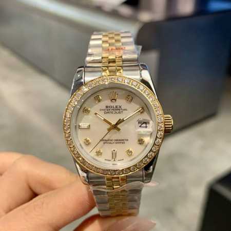 Rolex Datejust 31mm watch with a three-color dial, a wrist art piece where diamo - Click Image to Close