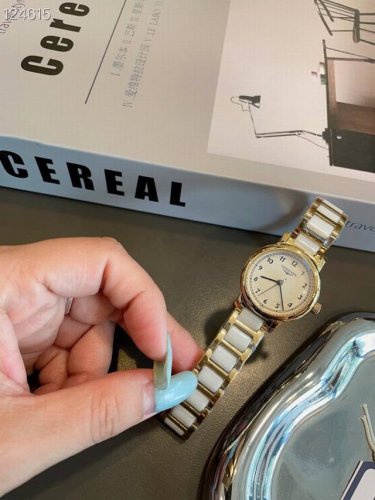 Longines Petite Gold Watch Understated yet exquisitely detailed, this watch is u