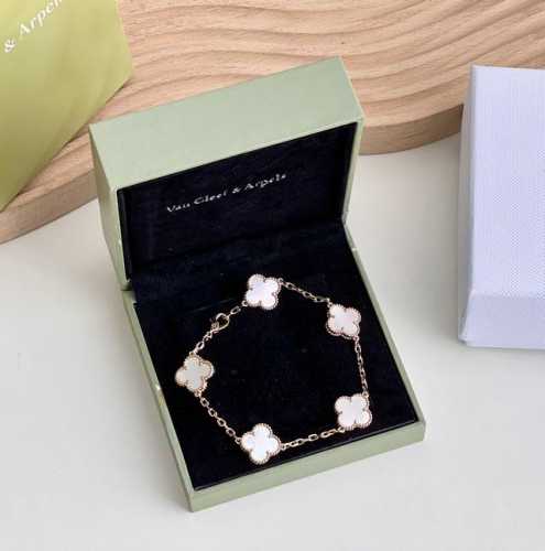 Van Cleef & Arpels "5-Flower White Mother-Of-Pearl Bracelet" Is Very Elegant. Th