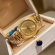 Gold Versace Millenyium Lady watch, featuring the brand's iconic Medusa and Ver