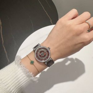 Louis Vuitton, sapphire crystal, Swiss movement. The Monogram flower on the dial