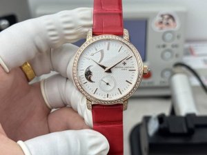 The Vacheron Constantin Patrimony Moon Phase watch features a 36mm round white g