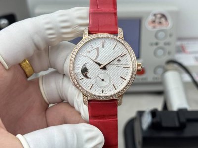 The Vacheron Constantin Patrimony Moon Phase watch features a 36mm round white g