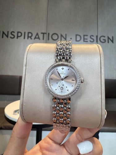 White Diamond and Gold Diamond Omega Goddess Teardrop Series Watch. Its exquisit
