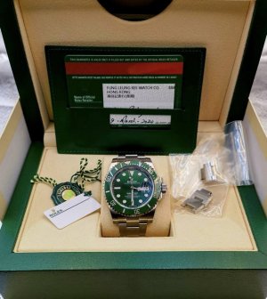 Rolex 116610Lv, discontinued second-generation green Submariner, complete set, b